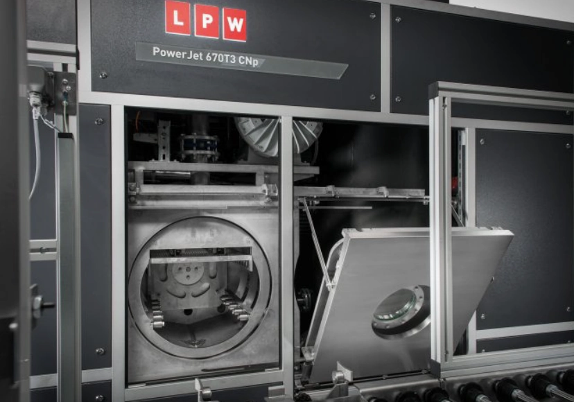 Cleaning chamber for an LPW PowerJet industrial machine with an immersion and ultrasonic system.