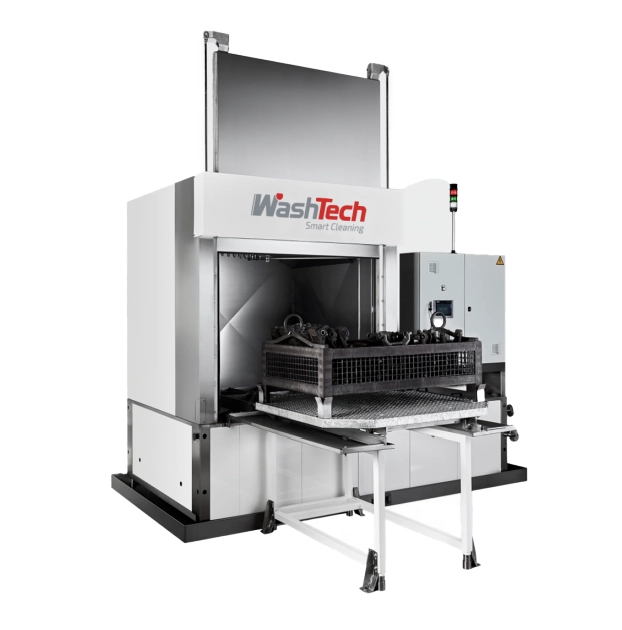 Industrial spray washing machine with an integrated rinse cycle.