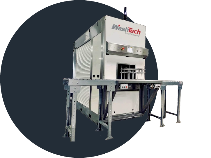 MecanoJet industrial washing machine with a conveyor belt.